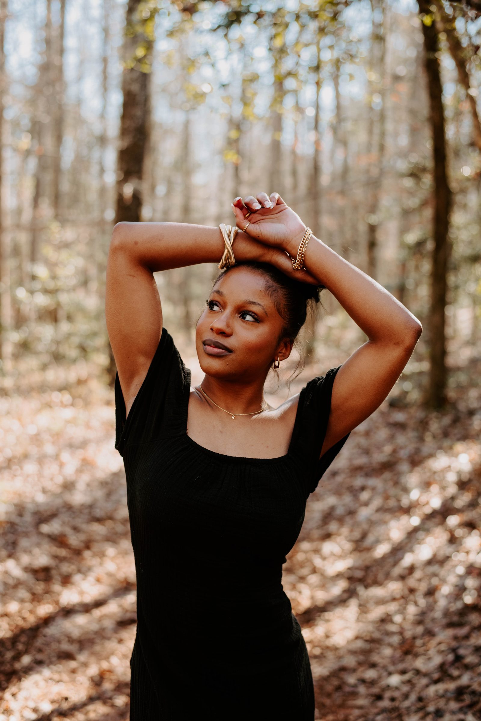 Modern editorial portrait in black studio styling